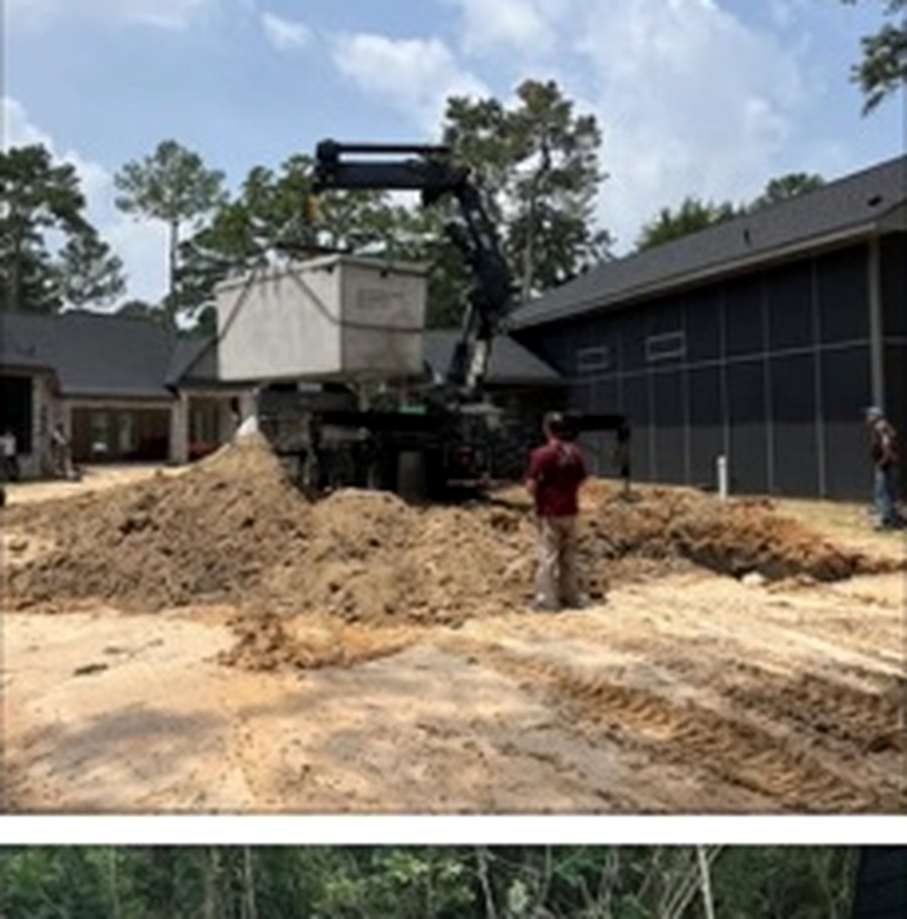 Creekline delivering and setting a septic tank